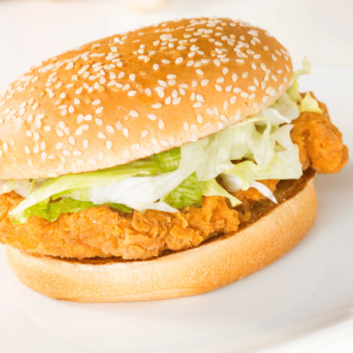Pan-fried chicken filet sandwich on a soft bun with crispy golden chicken
