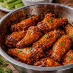 crispy buffalo chicken wings tossed in classic buffalo sauce with celery and dipping sauces