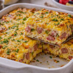 Ham and cheese breakfast casserole baked until golden brown and served in a casserole dish
