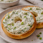 Bowl of homemade scallion cream cheese made with fresh scallions and cream cheese