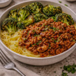 Sloppy Joe bowl served over spaghetti squash with roasted broccoli on the side