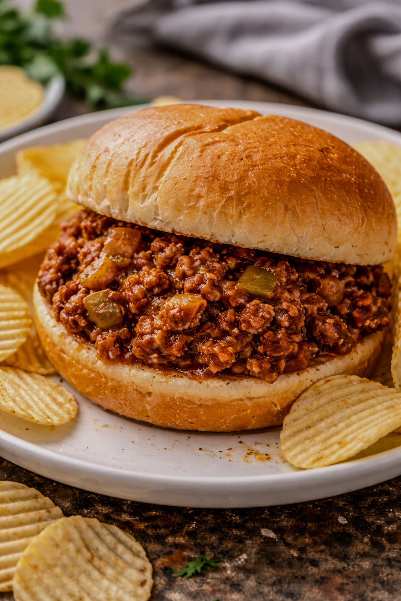 Classic sloppy joes made with ground beef in a rich tomato sauce served on soft hamburger buns