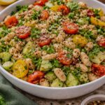 Mediterranean white bean salad with cannellini beans, cucumber, tomatoes, parsley, mint, and lemon dressing